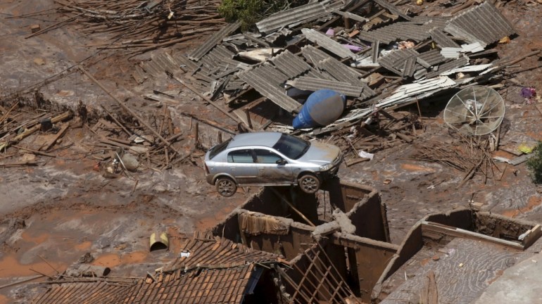 Debris is pictured in the Bento Rodigues district which was covered in mud after the Vale SA and BHP Billiton Ltd dam burst, Mariana.